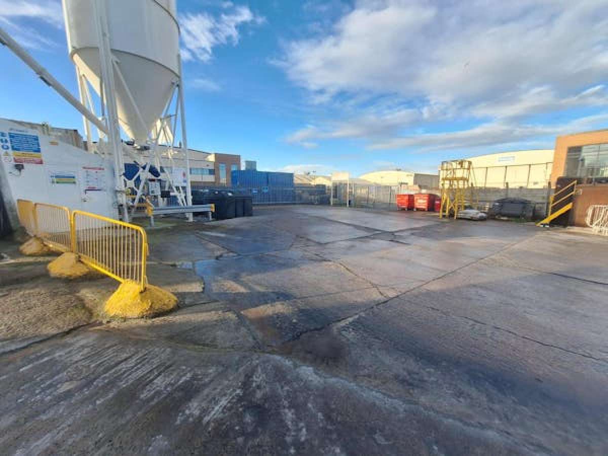 A securely fenced, rectangular concrete surfaced plot on a 0.53 acre site in Crewe - photo 3